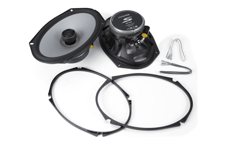 Car speakers with wiring and mounting rings.