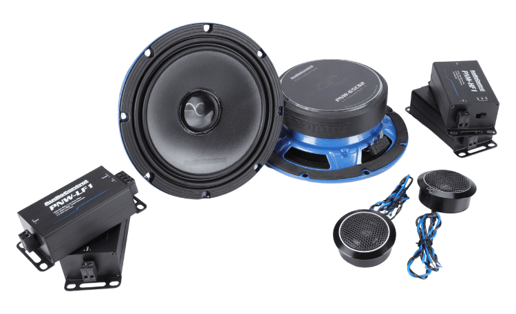 Car audio speakers and components set on display.