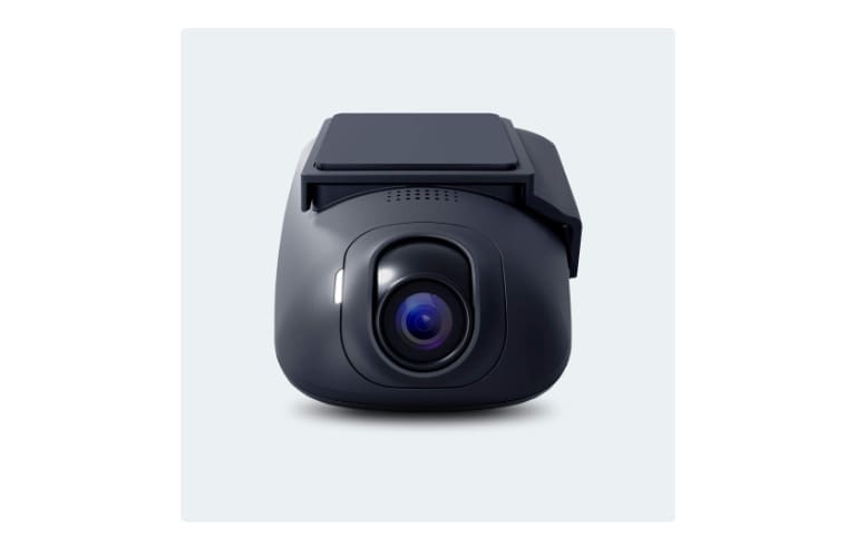 Compact dashcam with wide lens front view.