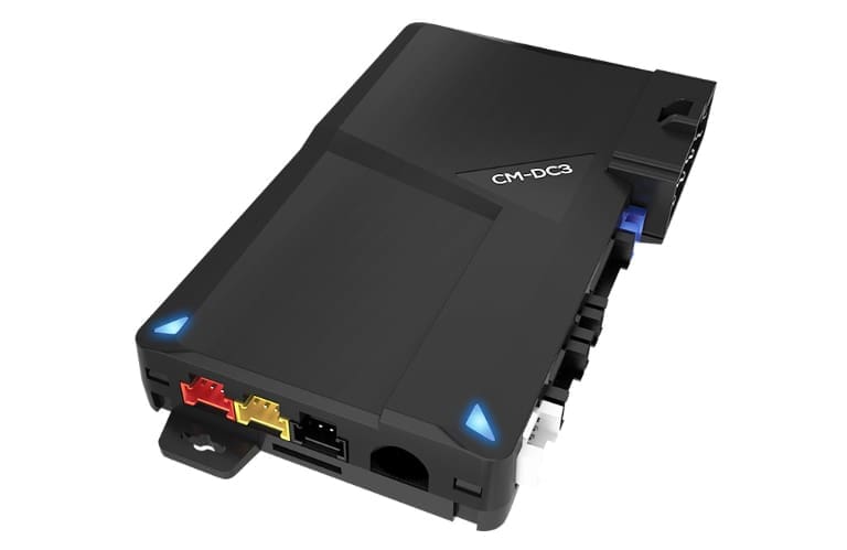 Black car alarm control module with colored ports.