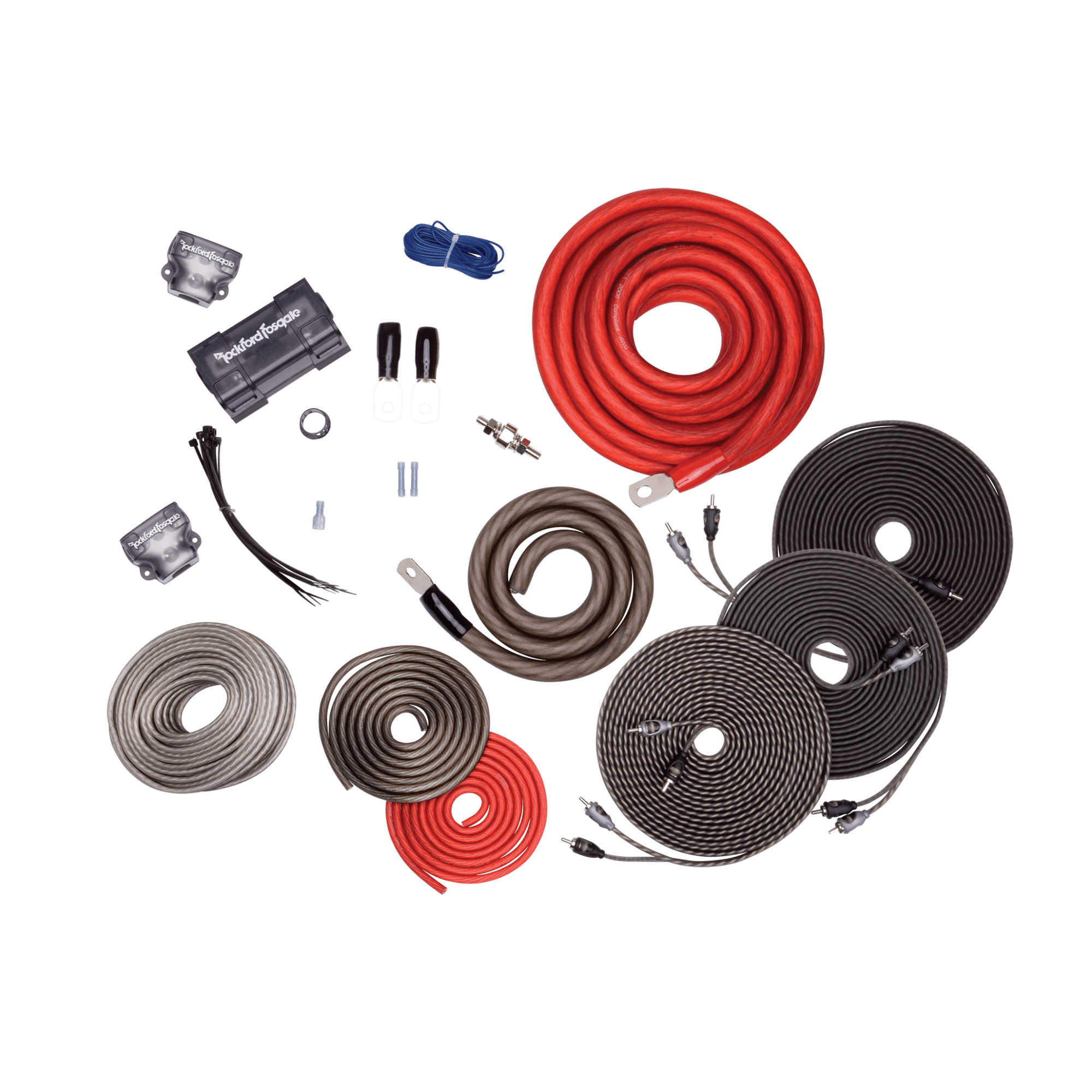 Assorted car audio wiring kit components displayed neatly.